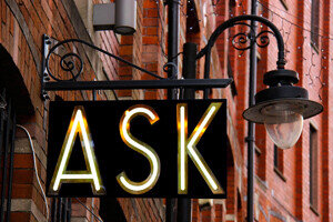street sign that says ask