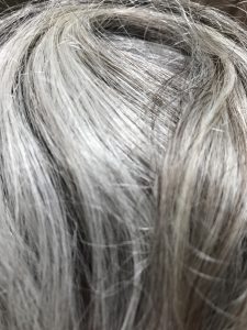 Image of gray hair folded