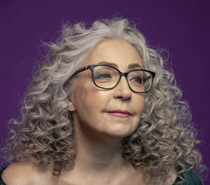 image of woman with silver curly hair