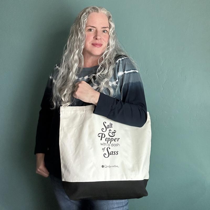 Salt & Pepper with a dash of sass black and white cotton tote bag shown carried by Joli Campbell