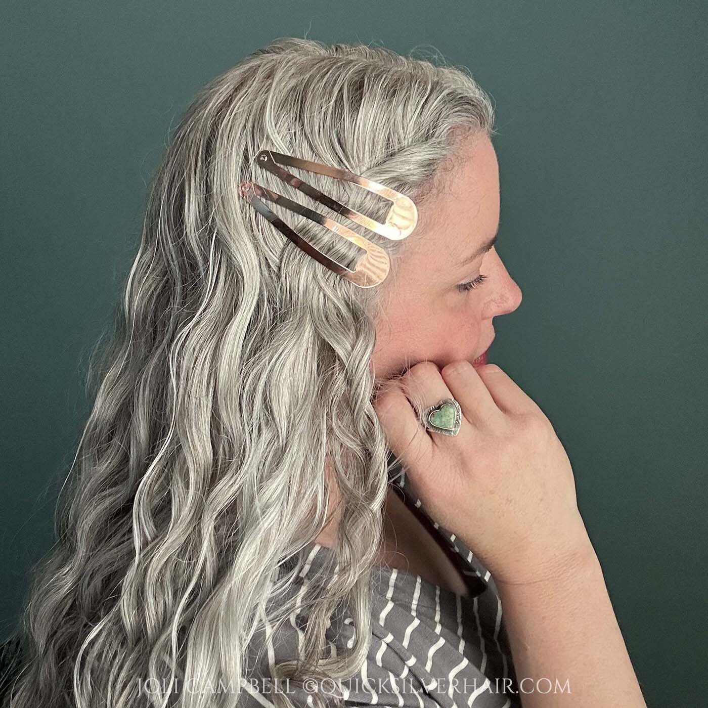 My silver wavy hair with extra large Kitsch rose barrettes together on one side