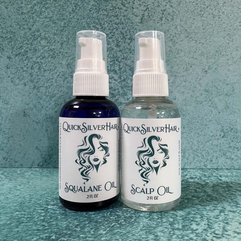 bottles of QuickSilverHair Squalane Oil and Scalp Oil